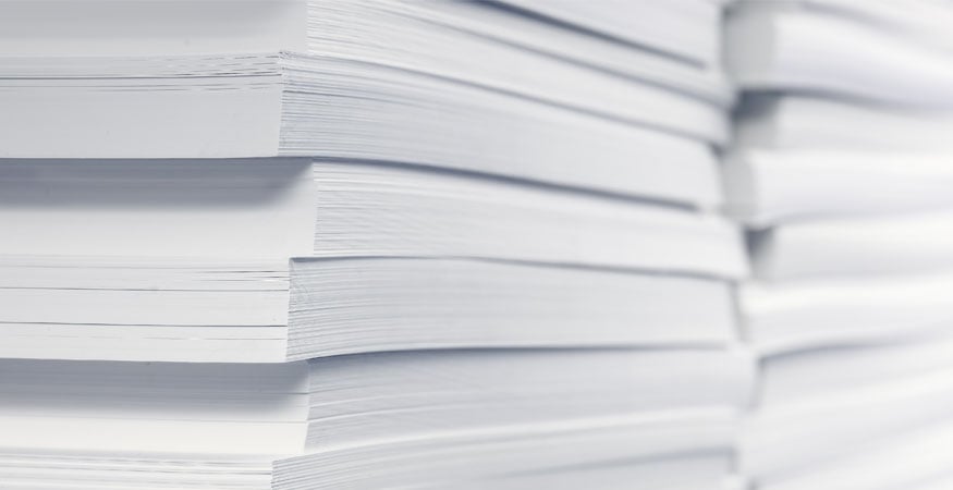stacks of plain white copier paper