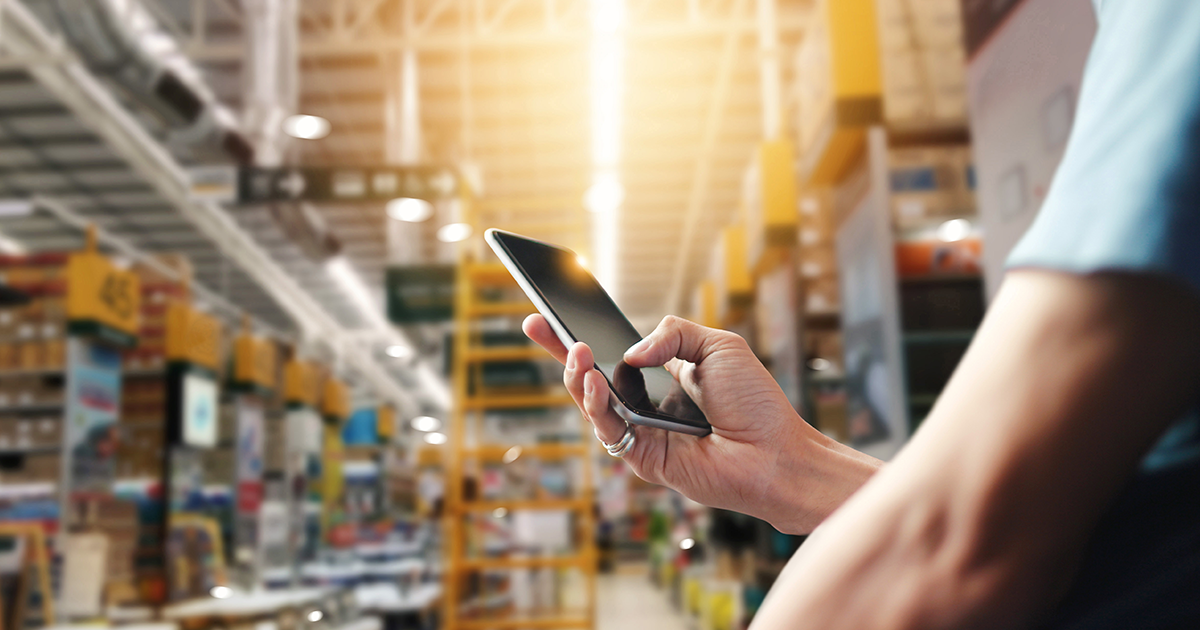 Answering a call on a mobile phone while inside a manufacturing plant
