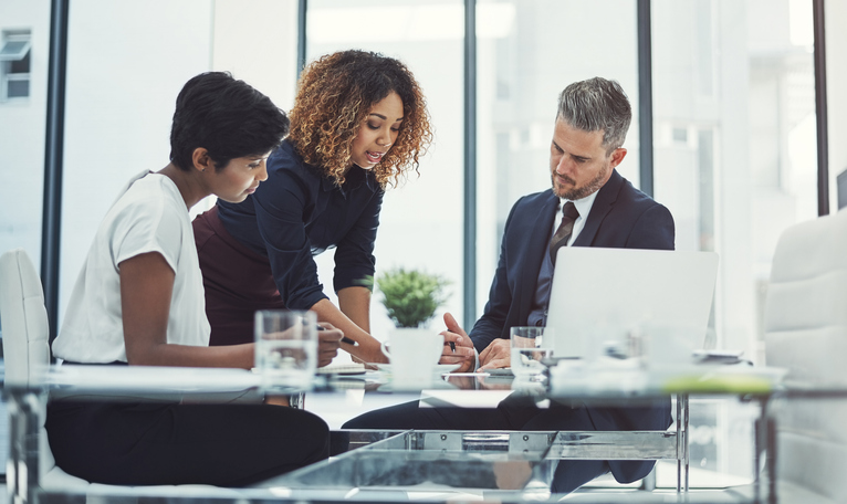 people working together at a table