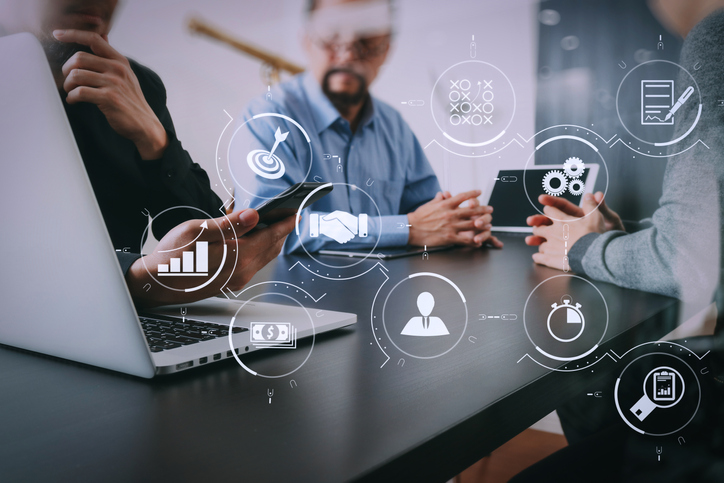 people discussing business technology options